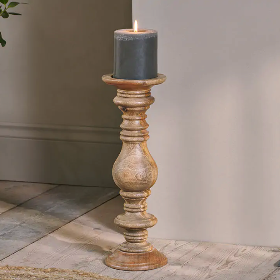 Akello wooden candle stick by Nkuku