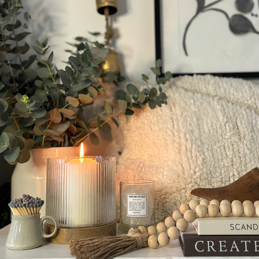 stoneware utensil pot used a s a vase with eucalyptus