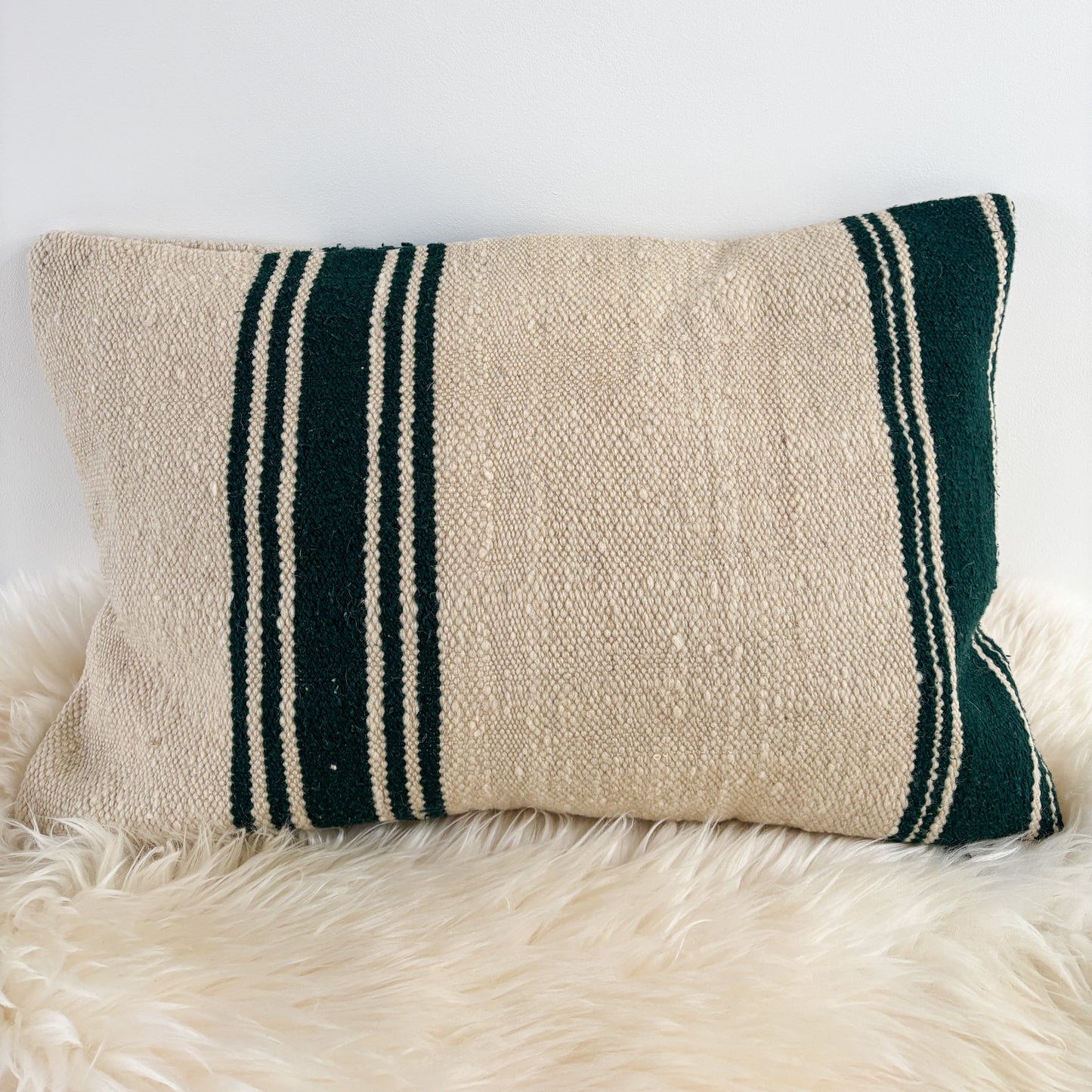 Moroccan Cushion with forest green stripes
