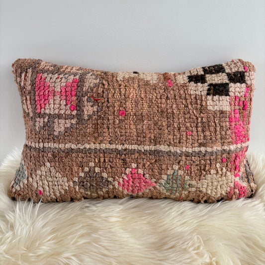 Textured Vintage Boujaad  pillow with geometric pattern on a white surface