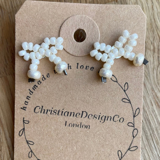 Sterling Silver Mini Bow Stud Earrings with Pearl Style Glass Beads