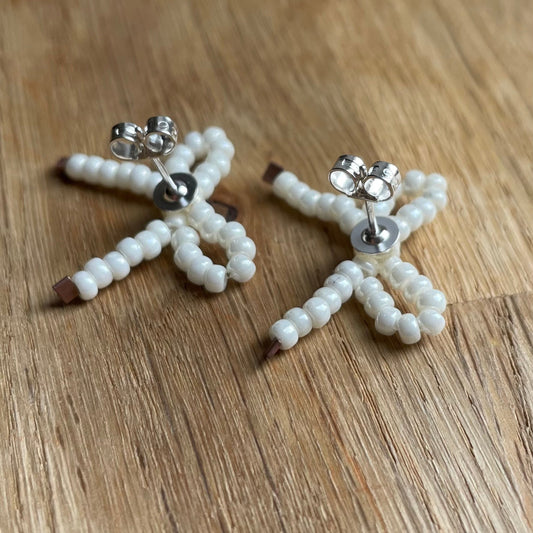 Sterling Silver Medium Bow Stud Earrings with Pearl Style Glass Beads