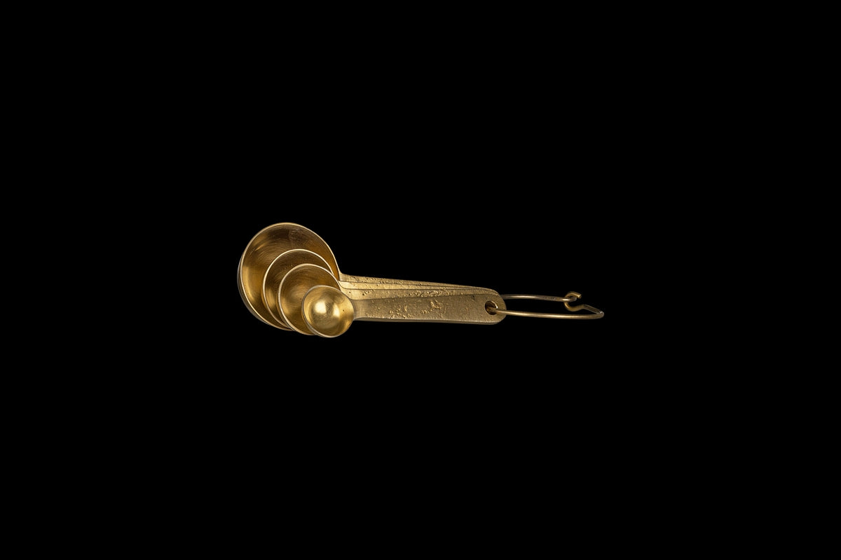 Mane Measuring Spoons in Brushed Gold By Nkuku